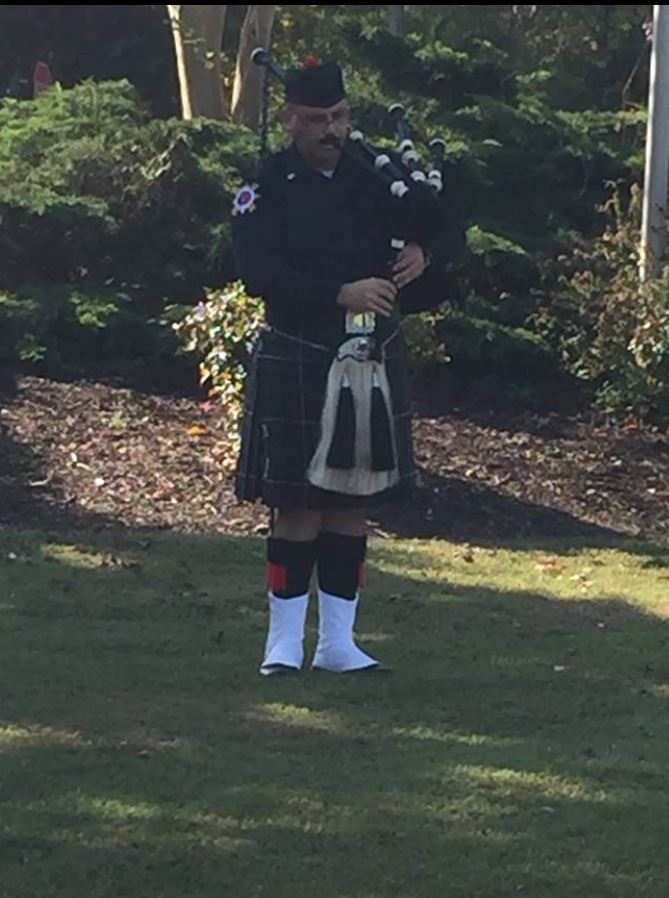 Bagpiper, Administration Captain W. J. Barss